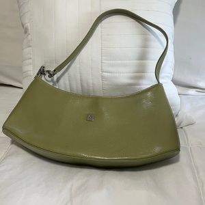 Small/medium olive green purse with shoulder strap.